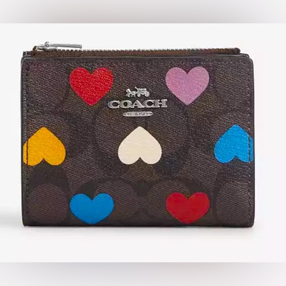 NWT Coach bifold wallet signature canvas with heart heart print SOLD OUT online - Picture 1 of 14
